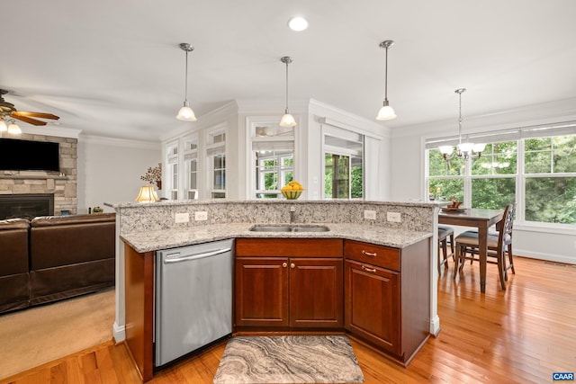 83 Mossy Creek Ct, Zion Crossroads, VA 22942 - kitchen with stainless steel dishwasher, a sink, open floor plan, a ceiling fan, and light wood-type flooring
