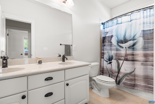 83 Mossy Creek Ct, Zion Crossroads, VA 22942 - full bathroom with double vanity, toilet, tile patterned flooring, and a shower with shower curtain