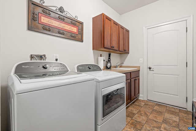 83 Mossy Creek Ct, Zion Crossroads, VA 22942 - laundry area with washing machine and dryer, stone finish floors, and cabinet space