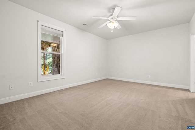 83 Mossy Creek Ct, Zion Crossroads, VA 22942 - unfurnished room with light colored carpet, baseboards, and a ceiling fan