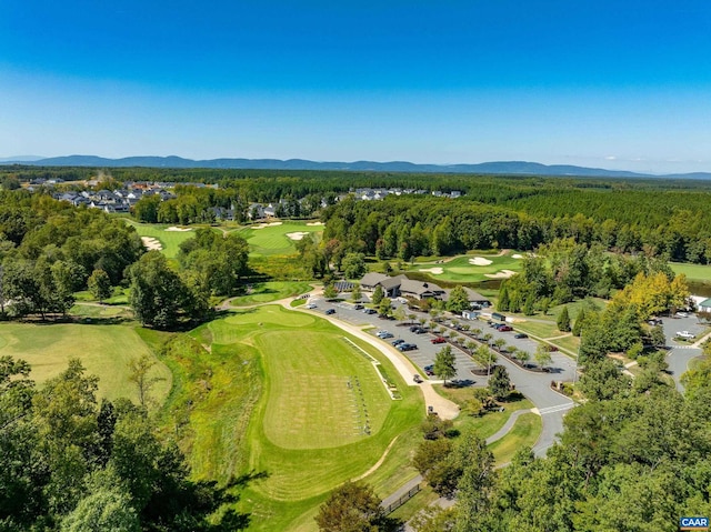 83 Mossy Creek Ct, Zion Crossroads, VA 22942 - aerial view of property's location featuring a local golf course, a mountainous background, and a heavily wooded area