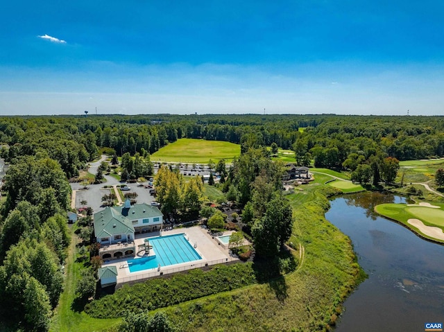 83 Mossy Creek Ct, Zion Crossroads, VA 22942 - drone / aerial view of a pool area, a nearby body of water, a heavily wooded area, and a local golf course