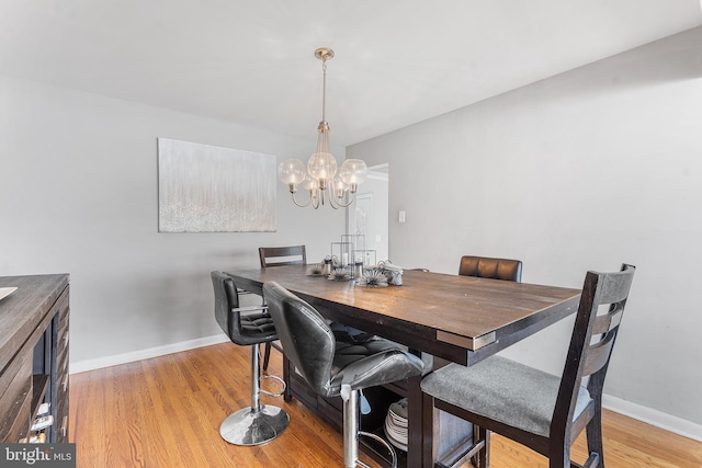 521 Rhode Island Ave, Cherry Hill, NJ 08002 - dining space with a chandelier, baseboards, and light wood-type flooring