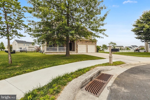 39 Grain Ct, Magnolia, DE 19962 - view of property hidden behind natural elements with driveway, a residential view, and an attached garage