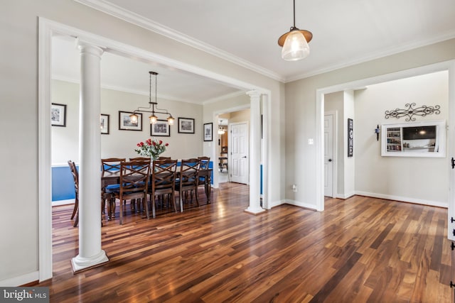 39 Grain Ct, Magnolia, DE 19962 - dining area with dark wood finished floors, ornamental molding, baseboards, and decorative columns