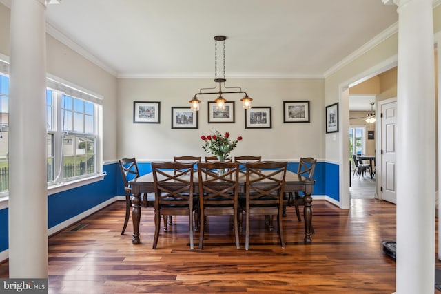 39 Grain Ct, Magnolia, DE 19962 - dining room featuring dark wood-style flooring, crown molding, baseboards, decorative columns, and ceiling fan