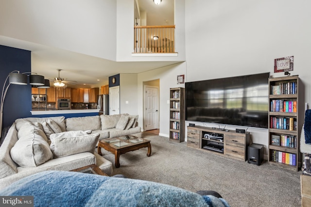 39 Grain Ct, Magnolia, DE 19962 - carpeted living area featuring a towering ceiling and a ceiling fan