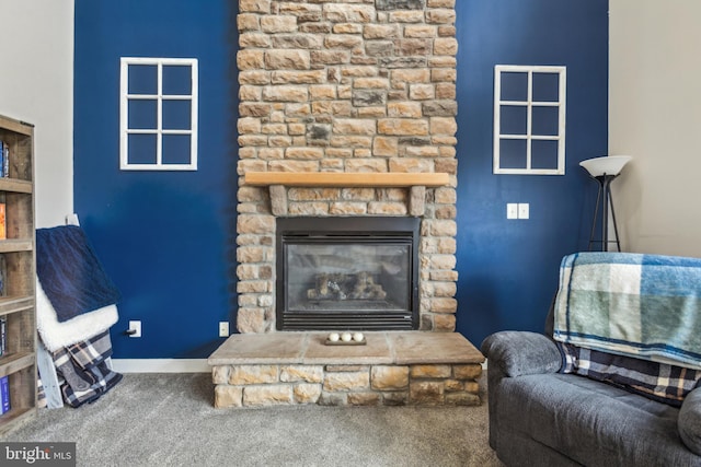 39 Grain Ct, Magnolia, DE 19962 - living room with carpet, a stone fireplace, and baseboards
