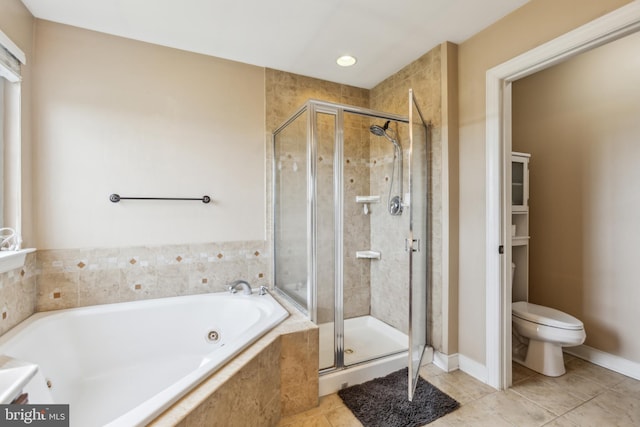 39 Grain Ct, Magnolia, DE 19962 - full bath featuring a whirlpool tub, a stall shower, toilet, and tile patterned flooring