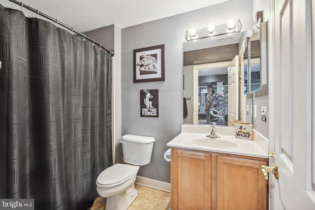 39 Grain Ct, Magnolia, DE 19962 - bathroom with toilet, vanity, tile patterned floors, curtained shower, and baseboards