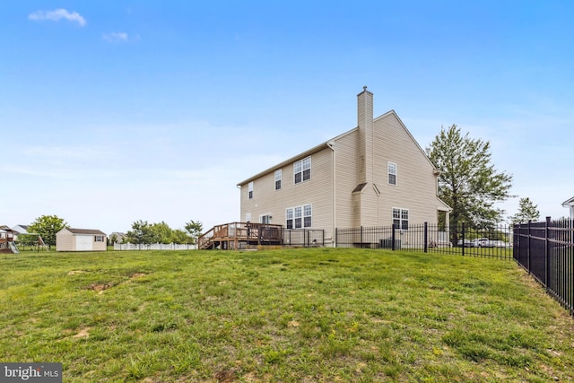 39 Grain Ct, Magnolia, DE 19962 - back of property featuring a chimney and a wooden deck