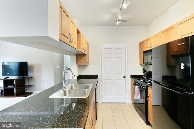 12900 Centre Park Cir Unit 107, Herndon, VA 20171 - kitchen featuring black appliances, light tile patterned floors, and rail lighting