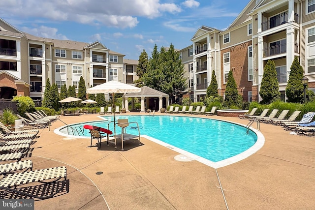 12900 Centre Park Cir Unit 107, Herndon, VA 20171 - community pool featuring a patio area and a gazebo