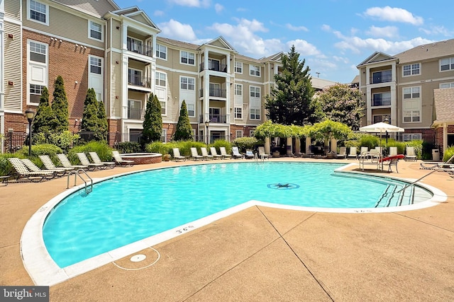 12900 Centre Park Cir Unit 107, Herndon, VA 20171 - community pool featuring a patio
