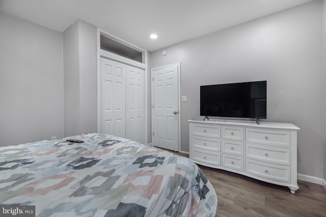 1707 W 4th St, Wilmington, DE 19805 - bedroom with wood finished floors, a closet, baseboards, and recessed lighting