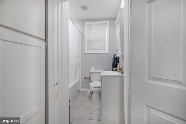 1707 W 4th St, Wilmington, DE 19805 - bathroom with vanity, toilet, tile patterned floors, shower / bath combo, and baseboards