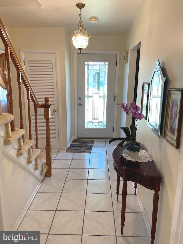 333 Sussex Blvd, Broomall, PA 19008 - entrance foyer with stairway, light tile patterned floors, and baseboards