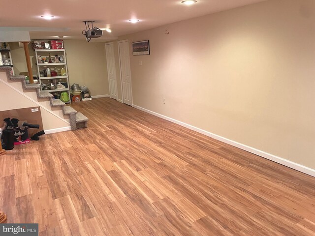 333 Sussex Blvd, Broomall, PA 19008 - finished basement with wood finished floors, baseboards, and stairs