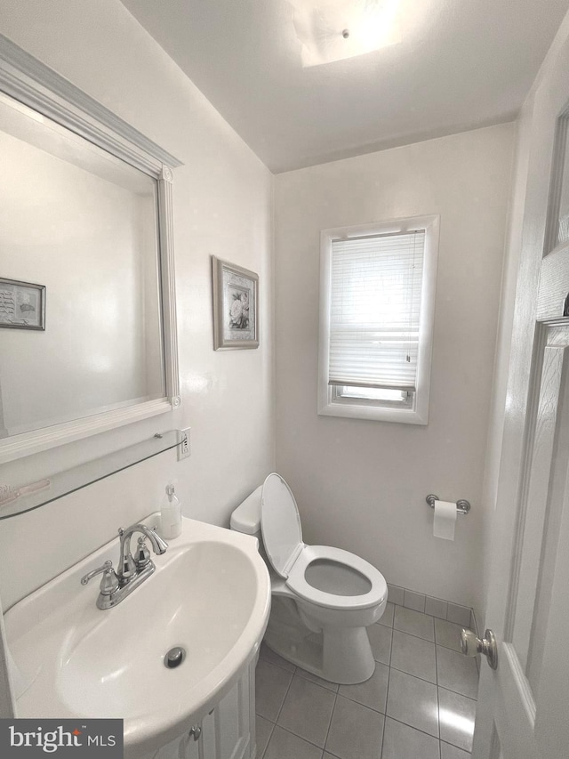 333 Sussex Blvd, Broomall, PA 19008 - half bathroom with a sink, tile patterned flooring, and toilet
