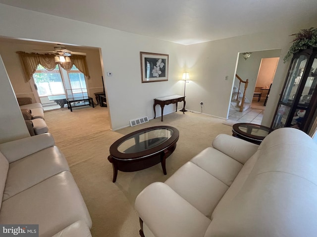 333 Sussex Blvd, Broomall, PA 19008 - living room with light carpet, stairs, and ceiling fan