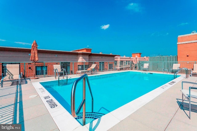 2425 L St NW Unit 328, Washington, DC 20037 - community pool featuring a patio area