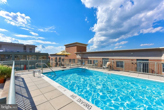 2425 L St NW Unit 328, Washington, DC 20037 - community pool featuring a patio