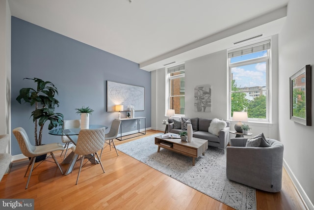 2425 L St NW Unit 328, Washington, DC 20037 - living room featuring wood finished floors and baseboards