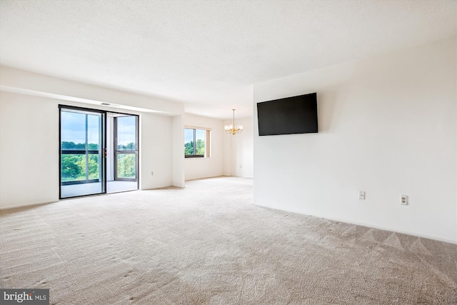 3330 N Leisure World Blvd Unit 5-722, Silver Spring, MD 20906 - carpeted empty room with a chandelier
