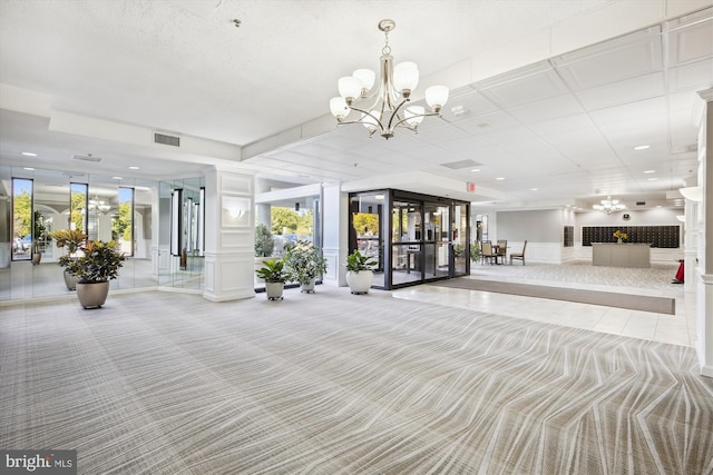 3330 N Leisure World Blvd Unit 5-722, Silver Spring, MD 20906 - building lobby with a decorative wall and recessed lighting