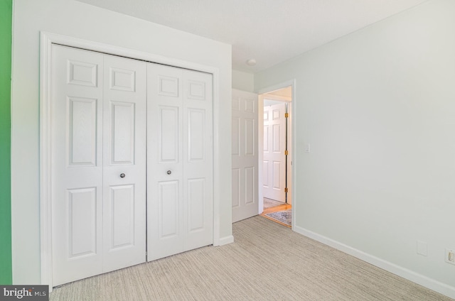 114 Austin Dr, Enola, PA 17025 - unfurnished bedroom featuring a closet, carpet flooring, and baseboards