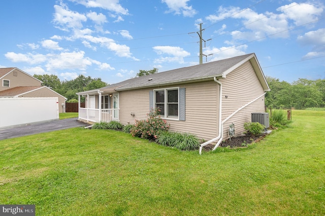 114 Austin Dr, Enola, PA 17025 - view of front of property featuring a front yard, central AC unit, and a porch