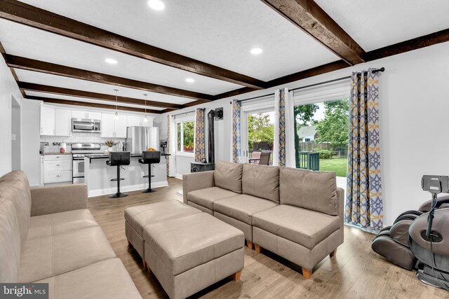 204 Kuethe Rd NE, Glen Burnie, MD 21060 - living room with light wood finished floors, beam ceiling, and recessed lighting