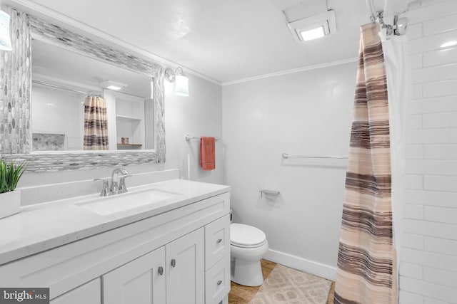 204 Kuethe Rd NE, Glen Burnie, MD 21060 - bathroom featuring vanity, toilet, crown molding, curtained shower, and baseboards