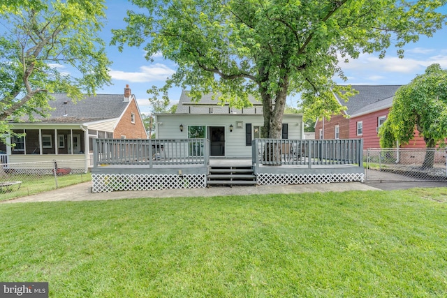 204 Kuethe Rd NE, Glen Burnie, MD 21060 - rear view of property with a deck and a sunroom