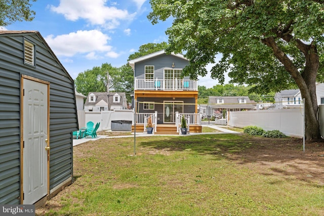 345 Townsend Rd, Essex, MD 21221 - back of property featuring a deck, an outdoor structure, and a balcony