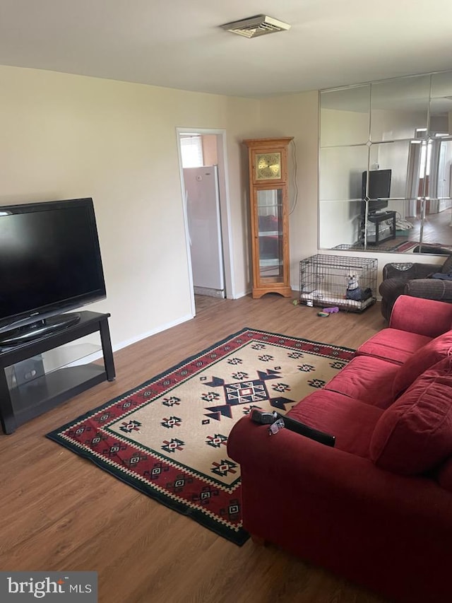 3755 Morrow Dr, Bensalem, PA 19020 - living room featuring wood finished floors and baseboards