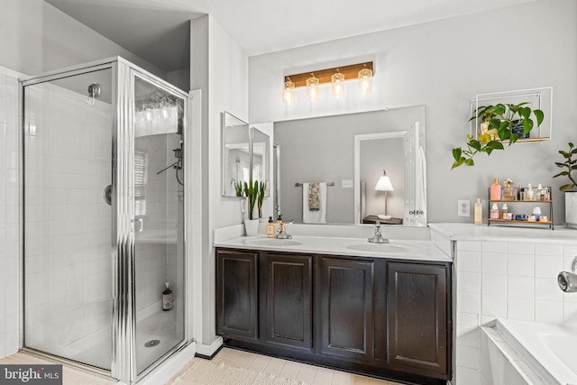 7250 Calm Sunset, Columbia, MD 21046 - bathroom featuring a stall shower, a bath, tile patterned floors, and double vanity