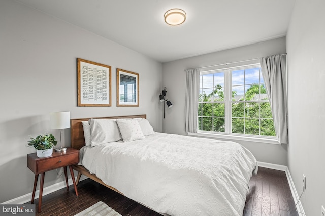 7250 Calm Sunset, Columbia, MD 21046 - bedroom featuring baseboards and dark wood-type flooring