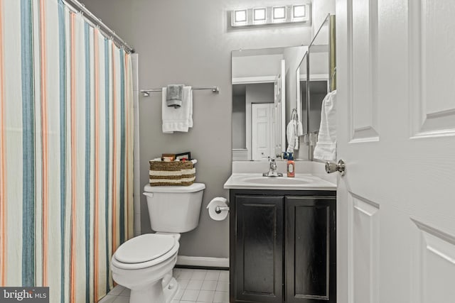 7250 Calm Sunset, Columbia, MD 21046 - full bath with tile patterned floors, toilet, vanity, baseboards, and a shower with curtain