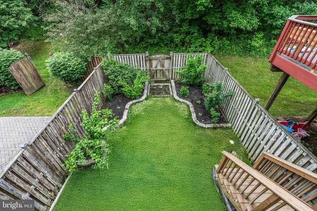 7250 Calm Sunset, Columbia, MD 21046 - view of yard with a wooden deck