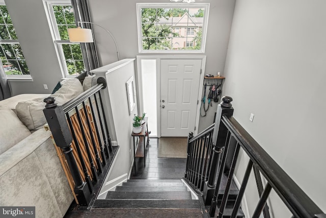 7250 Calm Sunset, Columbia, MD 21046 - entrance foyer with hardwood / wood-style flooring, baseboards, a chandelier, and stairway