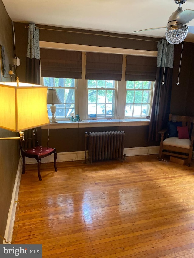 6136 Wayne Ave Unit 3, Philadelphia, PA 19144 - sitting room with radiator heating unit, hardwood / wood-style flooring, and baseboards