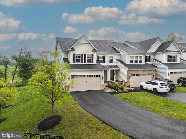 118 W Donovan Dr, Media, PA 19063 - view of front of property with driveway, stone siding, an attached garage, and a front yard
