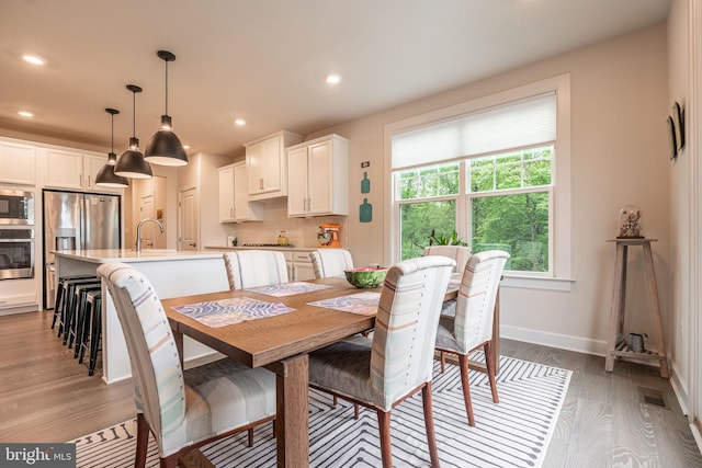 118 W Donovan Dr, Media, PA 19063 - dining room with light wood-style floors, recessed lighting, and baseboards