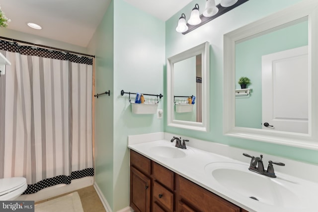 12752 Effie Rose Pl, Woodbridge, VA 22192 - bathroom featuring double vanity, toilet, tile patterned floors, and a shower with curtain