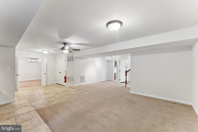 12752 Effie Rose Pl, Woodbridge, VA 22192 - finished basement featuring baseboards, ceiling fan, and light colored carpet
