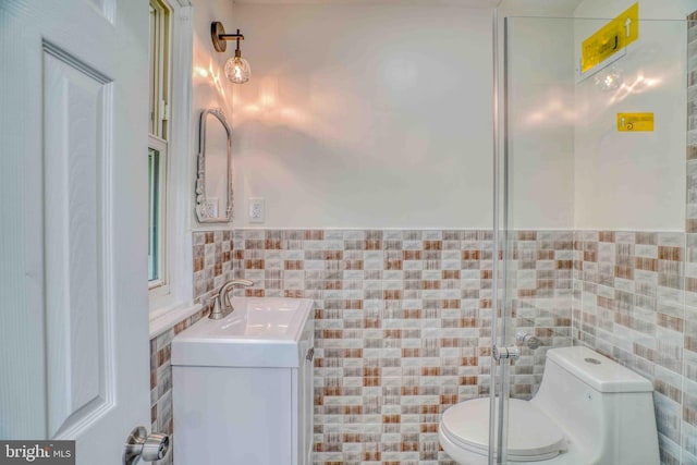 611 Parkview Blvd, Lansdowne, PA 19050 - bathroom with tile walls, toilet, vanity, and wainscoting