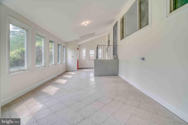 611 Parkview Blvd, Lansdowne, PA 19050 - unfurnished room featuring light tile patterned flooring, baseboards, and vaulted ceiling
