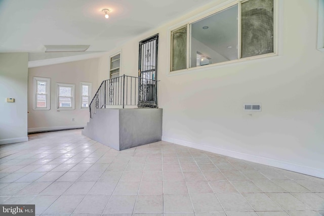 611 Parkview Blvd, Lansdowne, PA 19050 - tiled empty room with stairs and baseboards
