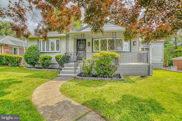 611 Parkview Blvd, Lansdowne, PA 19050 - view of front facade featuring a front yard and covered porch